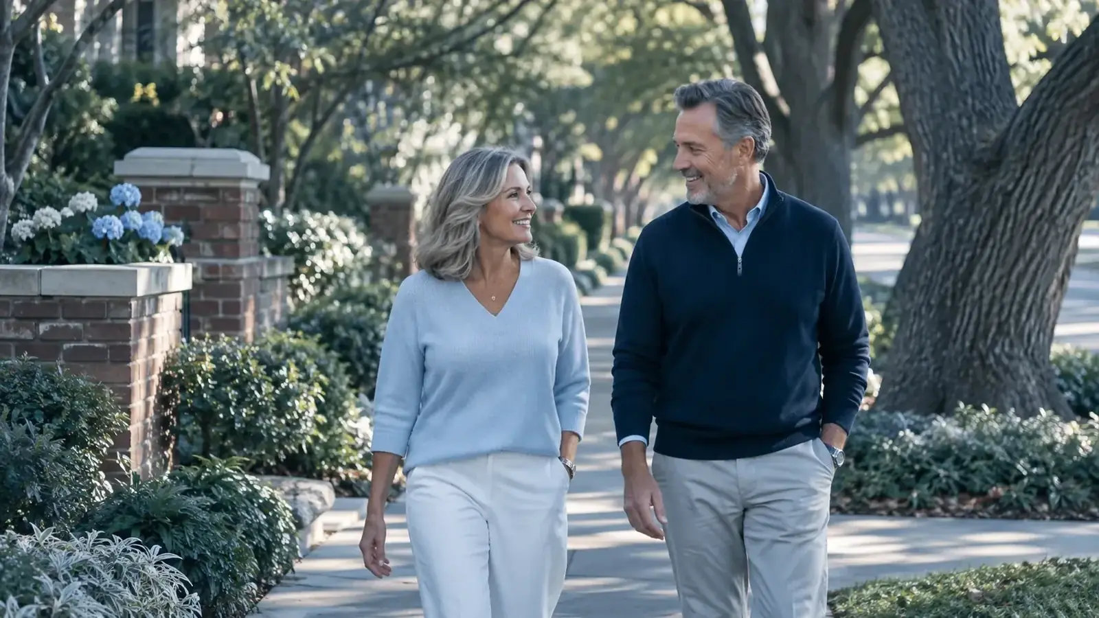 Neighbors in conversation on a tree-lined path